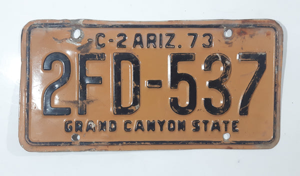 1973 Arizona Grand Canyon State C-2 Black Letters On Orange Metal Vehicle License Plate Tag 2FD 537