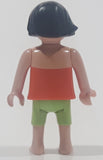 Geobra Playmobil Small Black Haired Girl Child Green Shorts Orange Blouse Tank Top 2 1/8" Tall Toy Figure