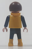 1992 Geobra Playmobil Small Brunette Child Black Pants Yellow Green Black Vest 2 1/8" Tall Toy Figure