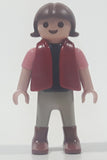 1992 Geobra Playmobil Small Brunette Girl Child Grey Pants Pink and Black Shirt with Magenta Vest 2 1/8" Tall Toy Figure