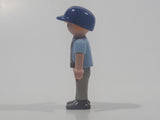 1995 Geobra Playmobil Small Blonde Boy Child Brown and Grey Overalls Light Blue Shirt Blue Hat 2 1/8" Tall Toy Figure