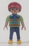 1995 Geobra Playmobil Small Brunette Boy Child Blue Pants Orange and Blue Striped Green Shirt Red Cap 2 1/8" Tall Toy Figure