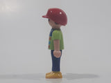 1995 Geobra Playmobil Small Brunette Boy Child Blue Pants Orange and Blue Striped Green Shirt Red Cap 2 1/8" Tall Toy Figure