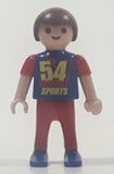 1995 Geobra Playmobil Small Brunette Boy Child Red Pants Dark Blue and Red Sleeved 54 Action Sports Shirt 2 1/8" Tall Toy Figure