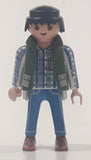 1994 Geobra Playmobil Black Hair Blue Pants White Blue and Grey Plaid Shirt with Olive Green Vest 2 3/4" Tall Toy Figure