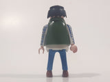 1994 Geobra Playmobil Black Hair Blue Pants White Blue and Grey Plaid Shirt with Olive Green Vest 2 3/4" Tall Toy Figure