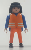 1990 Geobra Playmobil Black Hair Bright Orange Pants Blue Shirt Orange Vest 2 3/4" Tall Toy Figure