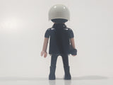 1992 Geobra Playmobil Black Hair Black Uniform White Helmet Police Officer 2 3/4" Tall Toy Figure