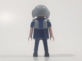1997 Geobra Playmobil Brunette Hair Blue Uniform Grey Helmet Firefighter 2 3/4" Tall Toy Figure