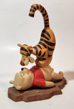 Disney Pooh & Friends "Friends Put A Bounce In Your Heart" Tigger Standing on Winnie's Belly 6" Tall Ceramic Figurine