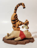 Disney Pooh & Friends "Friends Put A Bounce In Your Heart" Tigger Standing on Winnie's Belly 6" Tall Ceramic Figurine
