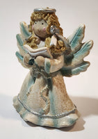 Angel Holding Song Book 4 3/4" Tall Resin Figurine