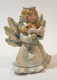 Angel Holding Song Book 4 3/4" Tall Resin Figurine
