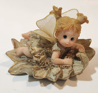 Angel Girl Child Lying on Flower 2 1/2" Tall Resin Figurine