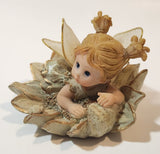 Angel Girl Child Lying on Flower 2 1/2" Tall Resin Figurine