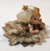Angel Girl Child Lying on Flower 2 1/2" Tall Resin Figurine