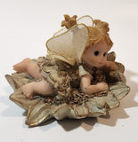 Angel Girl Child Lying on Flower 2 1/2" Tall Resin Figurine