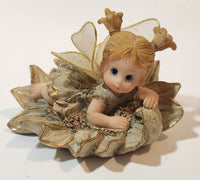Angel Girl Child Lying on Flower 2 1/2" Tall Resin Figurine