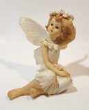 Angel Sitting 4 1/2" Tall Resin Figurine