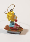Twentieth Century Fox The Simpsons Maggie Simpson on Sled 1 3/4" PVC Hanging Christmas Tree Ornament