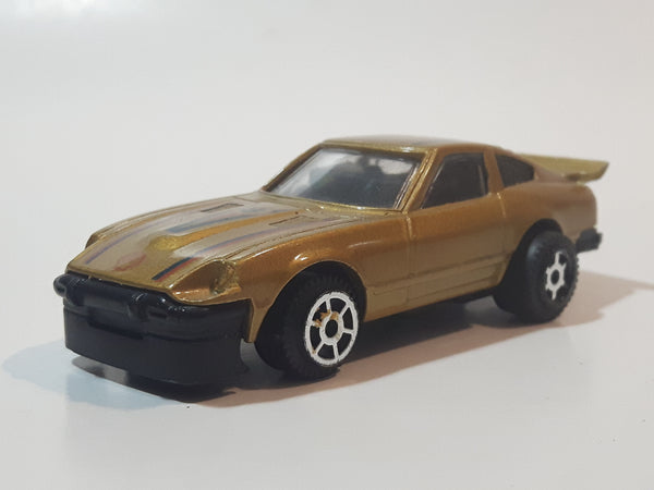Vintage No. B14 Nissan 280 ZX Shell Gold Pull Back Die Cast Toy Car Vehicle Made in Macau