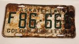 Vintage 1955 Saskatchewan Golden Jubilee Farm Vehicle Green Lettering White Vehicle License Plate Metal Tag 86 668