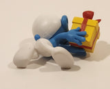 2023 Peyo The Smurfs Jokey Smurf with Present Gift 2 1/4" Tall Toy Figure