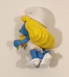 2023 Peyo The Smurfs Smurfette with Yellow Flower 2 1/8" Tall Toy Figure
