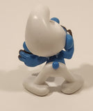 2023 Peyo The Smurfs Greedy Smurf Eating Cake 2 1/8" Tall Toy Figure