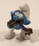 2023 Peyo The Smurfs Greedy Smurf Eating Cake 2 1/8" Tall Toy Figure
