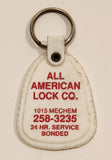 Vintage All American Lock Co. 1015 Mechem 24 Hr. Service Bonded White Plastic Fob Keychain Ring