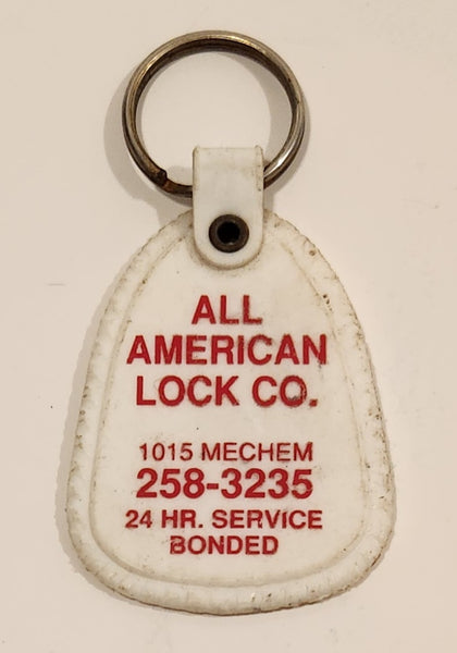 Vintage All American Lock Co. 1015 Mechem 24 Hr. Service Bonded White Plastic Fob Keychain Ring