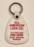 Vintage All American Lock Co. 1015 Mechem 24 Hr. Service Bonded White Plastic Fob Keychain Ring