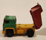 Vintage 1977 Universal Associated Co. Ltd. Dump Truck Green Red Yellow Pressed Steel and Plastic Toy Car Vehicle Made in Hong Kong