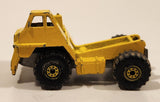 1980 Hot Wheels Workhorses CAT Caterpillar Dump Truck 777 Yellow Die Cast Toy Construction Vehicle