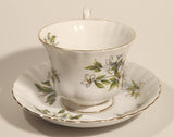 1970s Royal Albert Pacific Dogwood Floral Gold Trim Tea Cup and Saucer Set