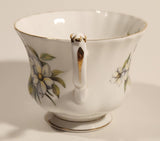 1970s Royal Albert Pacific Dogwood Floral Gold Trim Tea Cup and Saucer Set