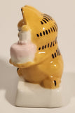 Vintage 1980s Enesco Style Garfield Holding Birthday Cake Porcelain Figurine