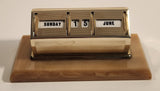 Vintage Brass Perpetual Date Calendar on Bakelite Base
