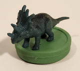 Green Styracosaurus Dinosaur Toy Figure on Green Base