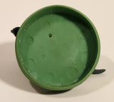 Green Styracosaurus Dinosaur Toy Figure on Green Base