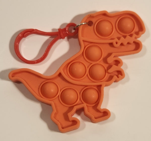 Pop It Orange Tyrannosaurus T-Rex Dinosaur Popper Fidget Toy Rubber Key Chain Clip On