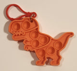 Pop It Orange Tyrannosaurus T-Rex Dinosaur Popper Fidget Toy Rubber Key Chain Clip On
