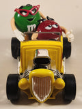 M & M's Yellow Hod Rod Shaped Candy Dispenser Machine with Red and Green Characters