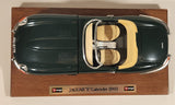 Burago 1961 Jaguar "E" Cabriolet Green 1/18 Scale Die Cast Toy Car Vehicle on Wood Display Stand JDU 877E