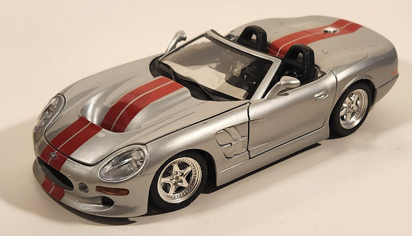 Burago 1999 Shelby Series 1 Silver with Red Stripes 1/18 Scale Die Cast Toy Car Vehicle with Opening Doors Hood