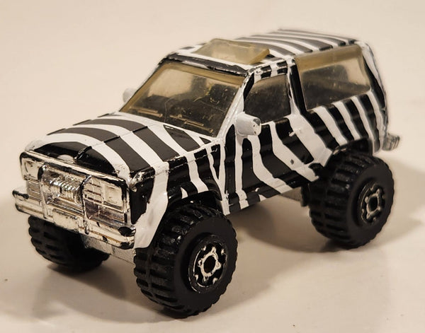 1996 Matchbox Off Road Ford Bronco II Zebra Black and White Striped Die Cast Toy Car Vehicle