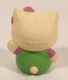 Sanrio Hello Kitty Sitting Pink Bow Green Overalls with Pink Flower 3" Rubber Toy Figure