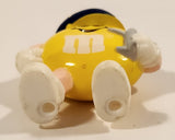 1990s M&Ms Yellow Character Pilot Holding Airplane 2 1/4" Tall Plastic Toy Figure