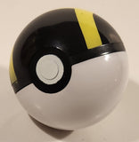 Nintendo Pokemon Pop Action Ultra Pokeball Black Yellow and White Plastic Toy Ball